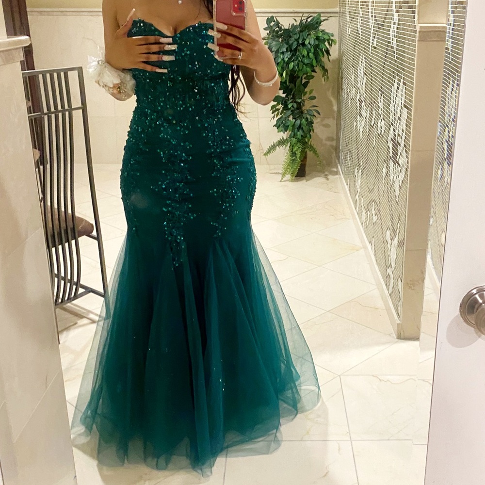 Emerald green, sweetheart, neckline prom dress, beaded, and sparkle bottom